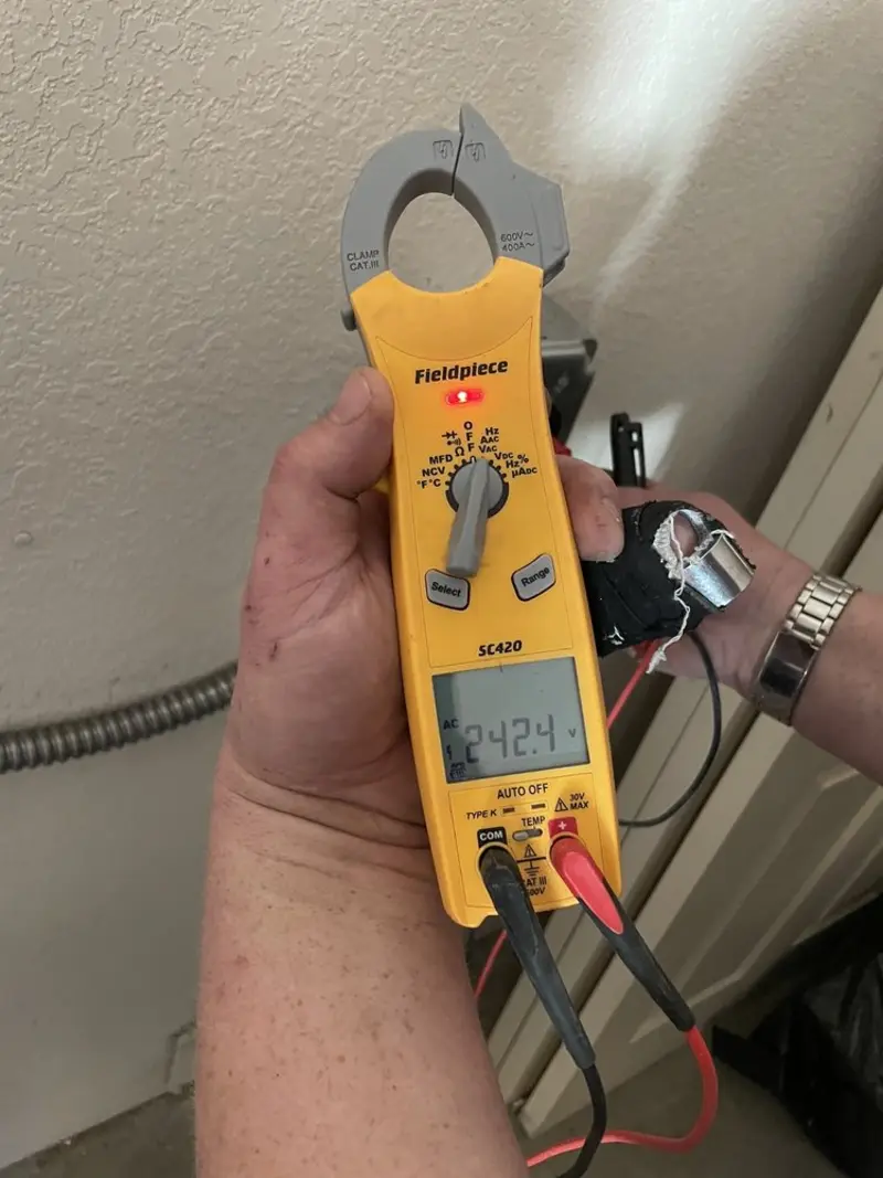 Voltage testing with clamp meter during Circuit Breaker Repair in Greentown